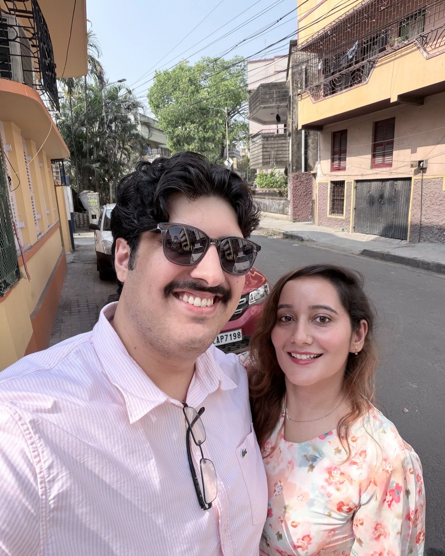 Varun and Khushboo on a sunny street